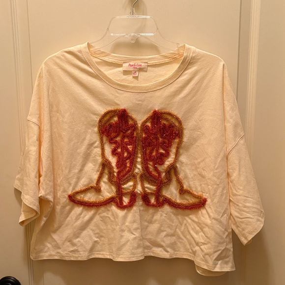 Peach Love California Tops - Peach Love California Cream Tee with Cowboy Boots Design